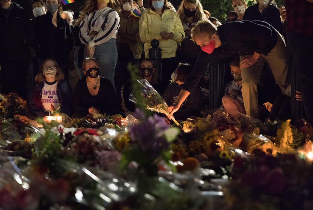 People gather to pay their respects for Ruth Bader Ginsburg at the Supreme Court.