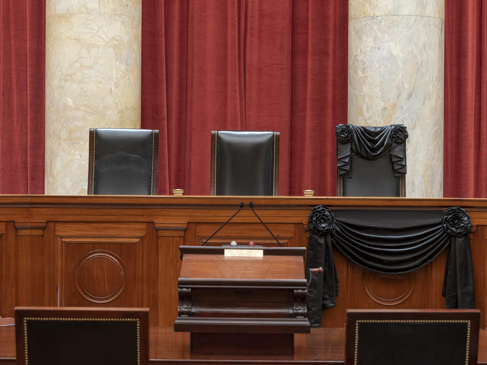 The bench draped for the death of Justice Ruth Bader Ginsburg.