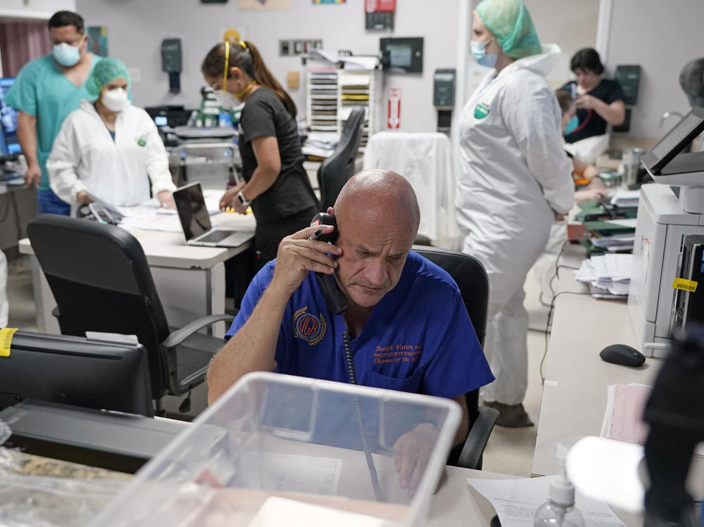 Dr. Joseph Varon notifies the family of a patient who died inside the coronavirus unit at Houston's United Memorial Medical Center on July 6. Varon tells NPR he's 