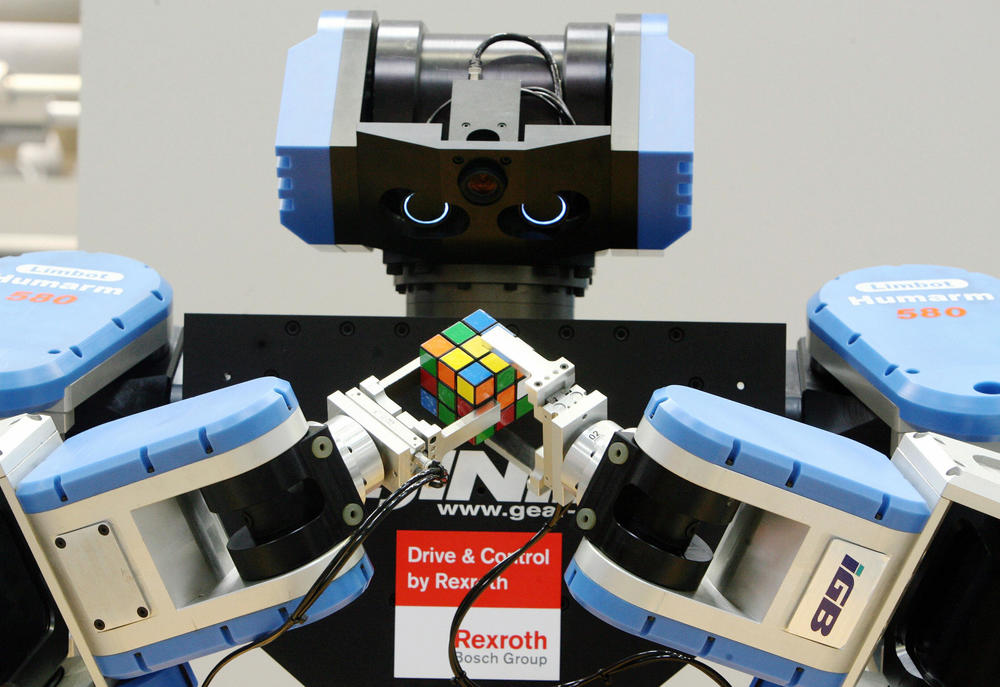 A robot works on a Rubik's cube at the trade fair grounds in Hanover, Germany in 2007.