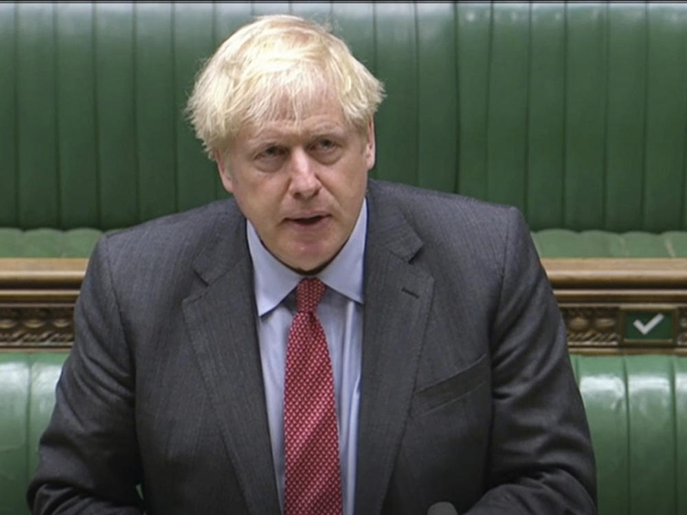 In this image taken from video, British Prime Minister Boris Johnson makes a statement to the House of Commons on the state of the COVID-19 pandemic.