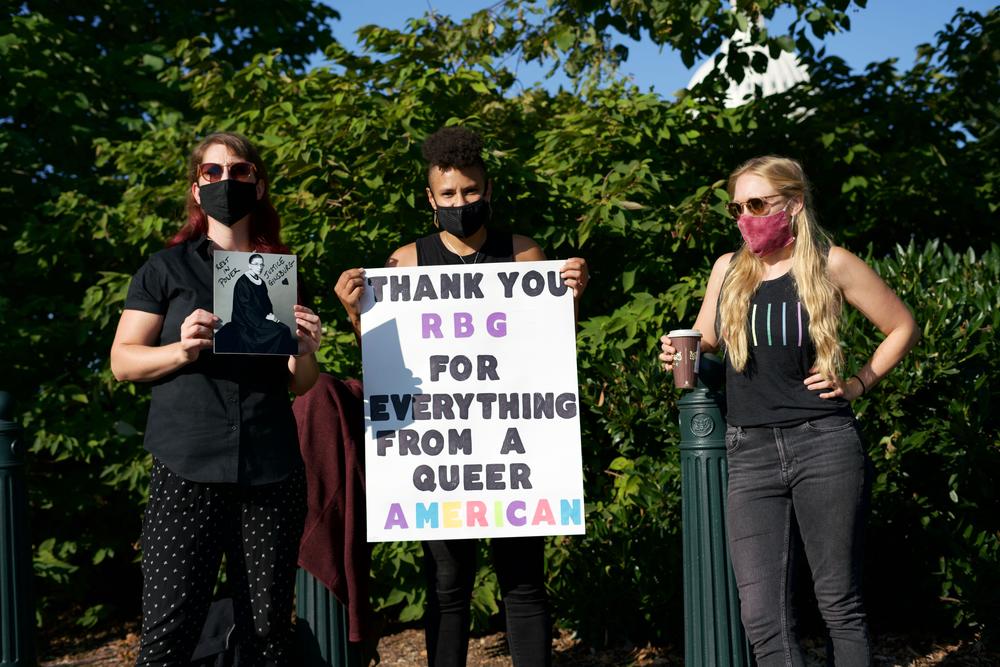 Christina Lecker (left), Chivonn Anderson and Sarah Stevens drove from Philadelphia Wednesday morning to pay their respects.