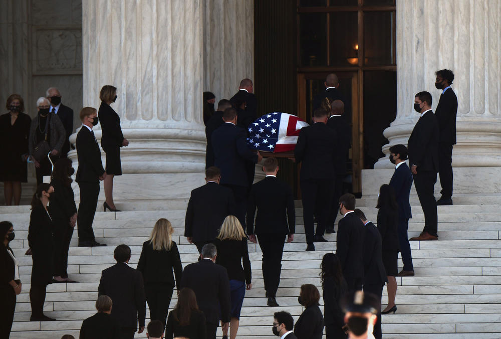 Justice Ruth Bader Ginsburg's casket is carried into the Supreme Court in Washington, D.C., on Wednesday.