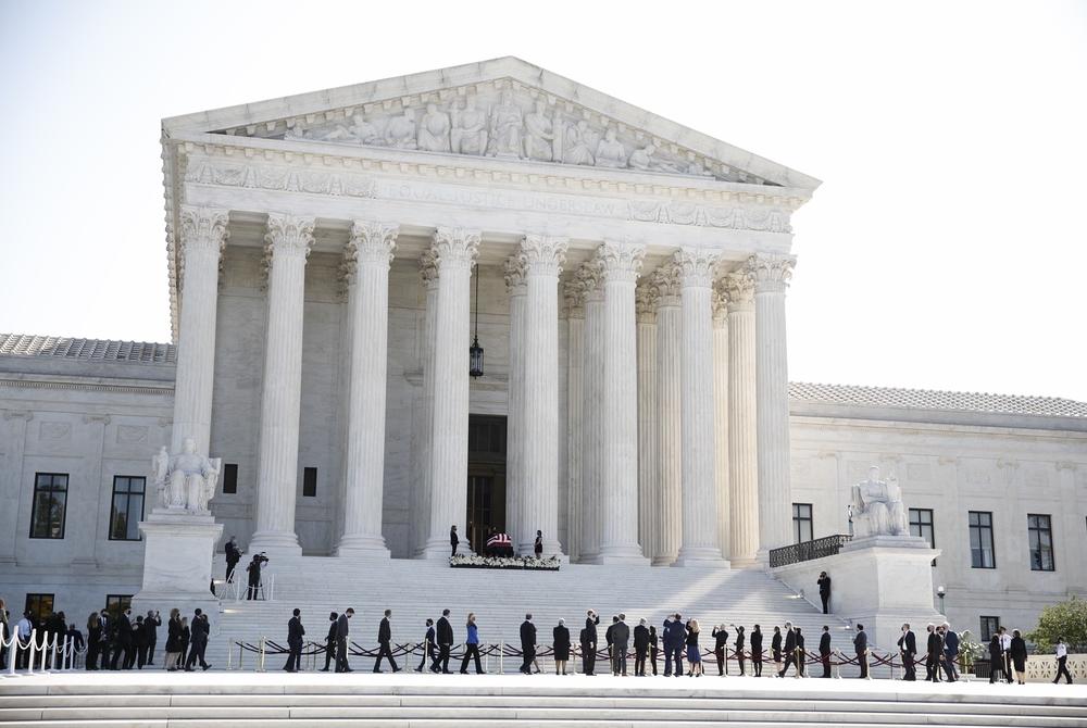 Supreme Court staff pay their respects for Associate Justice Ruth Bader Ginsburg.