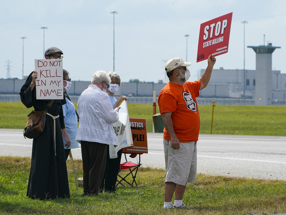 Demonstrators gathered across from the federal prison complex in Terre Haute, Ind., to protest the death penalty. Another execution is scheduled for Thursday.