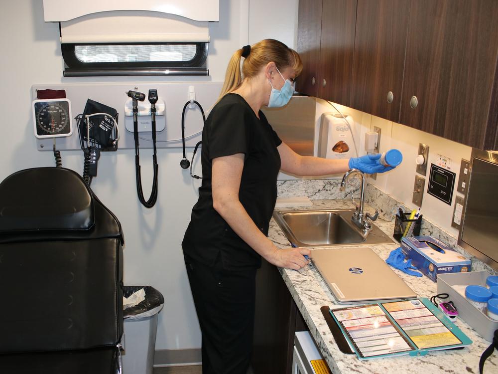 Couron preps urine samples in the mobile addiction treatment clinic to send to the lab for detailed analysis. Test strips within the specimen cup give an early assessment by instantly checking for 13 categories of drugs — from opiates to antidepressants.