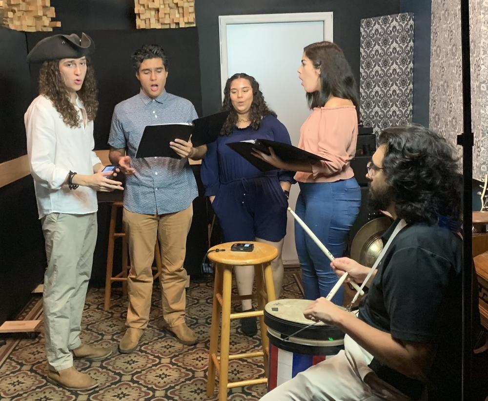 Some members of Voices of Freedom rehearse on a recent day. From left to right they are: Miguel Arango, Anthuan Rubbio, Vanesa Rodriguez, Vanessa Ruano and Federico Arango.