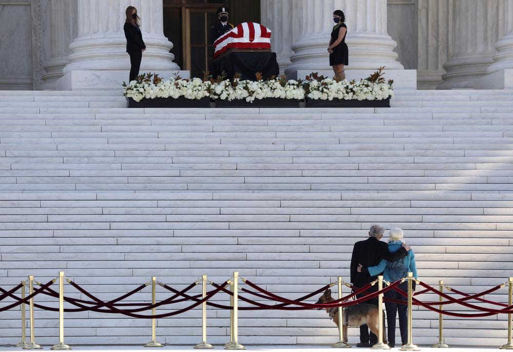 People pay respects to Ruth Bader Ginsburg.