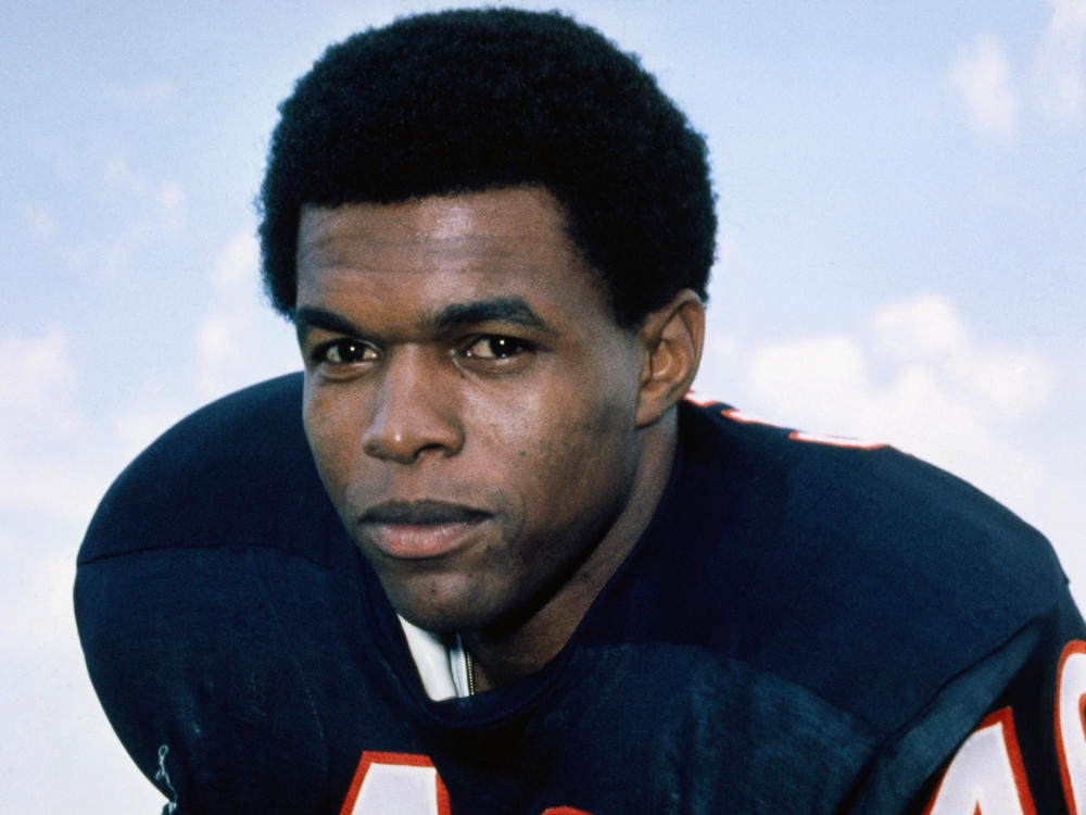 Gale Sayers, who held or shared 12 NFL records when he retired, has died at age 77. He famously dedicated an award to his friend and teammate Brian Piccolo.