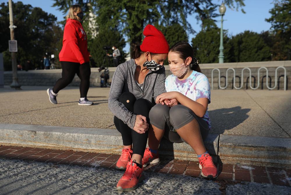 Jill Reedy and her daughter, Ava Reedy Martin, 11, are waiting for when Justice Ginsburg will lie in repose.