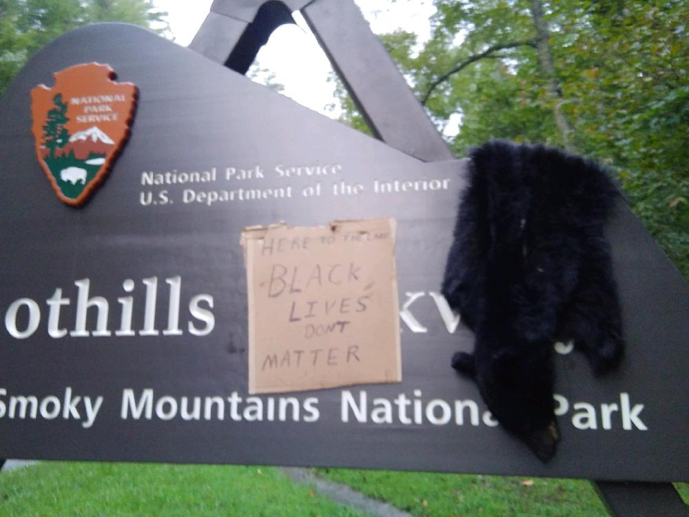 An entrance to Great Smoky Mountains National Park in Tennessee was vandalized last weekend with the skin of a black bear and a sign that read 