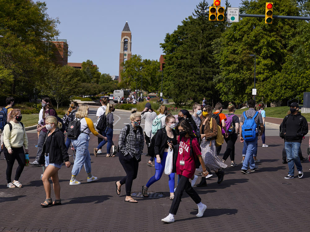 As students return to college campuses, the surrounding communities are seeing an increase in coronavirus infections.