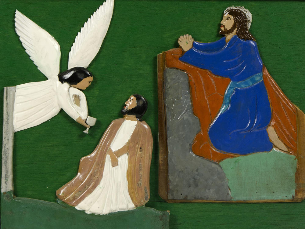 A page from <em>The Book of Wood: Rose of Sharon, Jesus Heals Woman Bleeding, Judas Kiss, Jesus in the Garden of Gethsemane,</em> 1932, paint on carved wood, mounted on wood panels