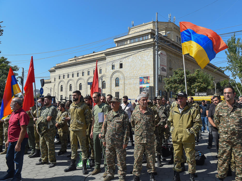 Servicemen and members of the Armenian Revolutionary Federation gather after the Armenian government declared martial law and military mobilization amidst growing conflict with Azerbaijan.