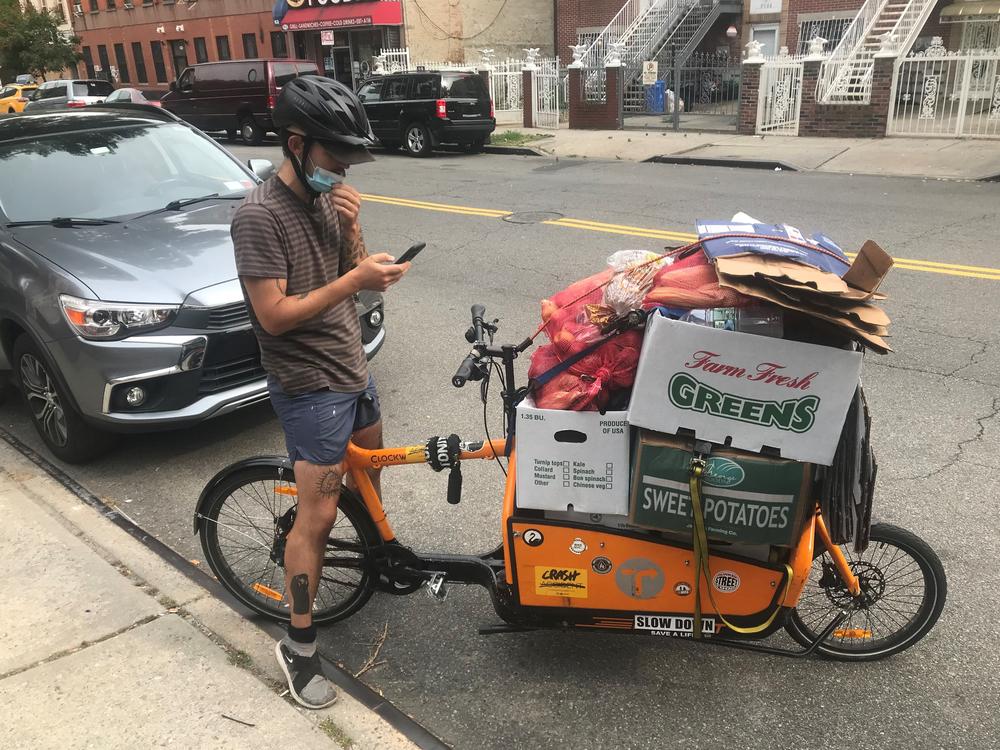 Volunteer Thadeaus Umpster with the anarchist collective In Our Hearts delivering donated produce to community fridges in the Bed Stuy section of Brooklyn.