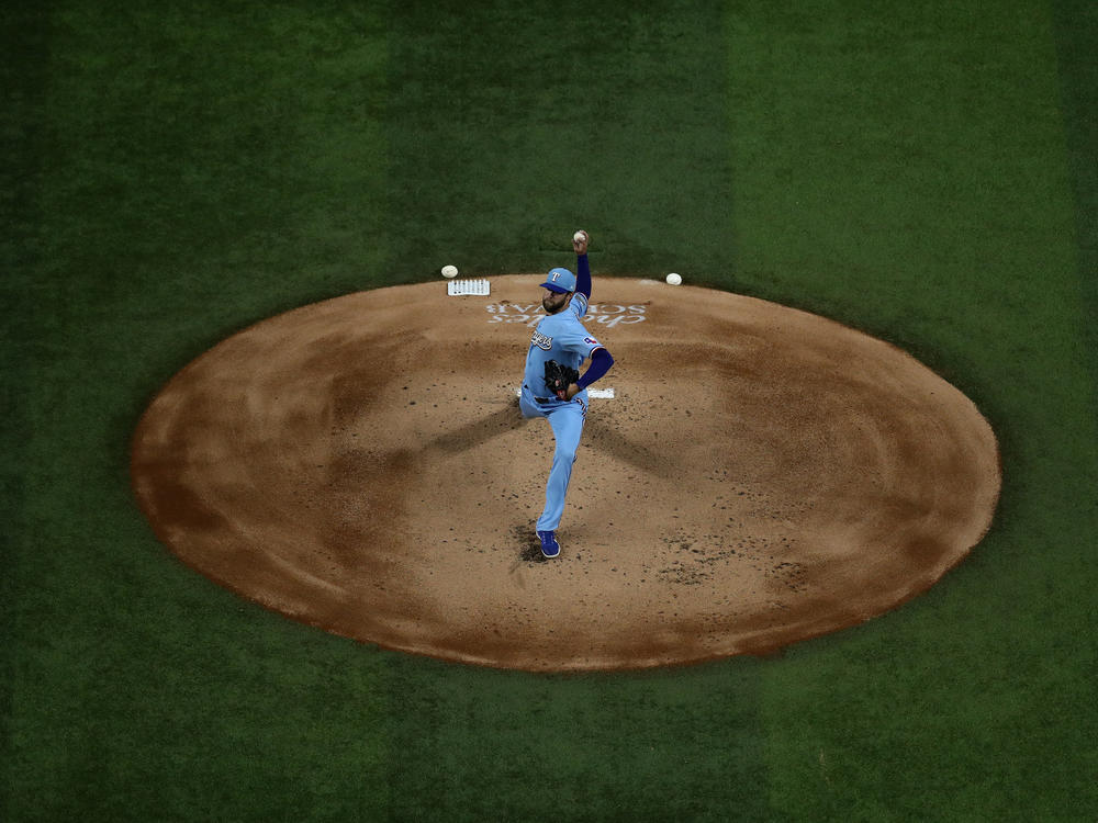 Jordan Lyles of the Texas Rangers throws against the Houston Astros in the final game of the regular season on Sunday.