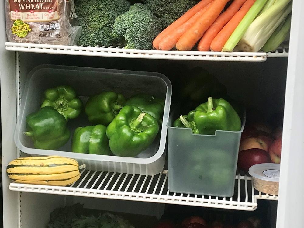 A free food refrigerator in New York City organized by volunteers with the volunteer collective A New World In Our Hearts.
