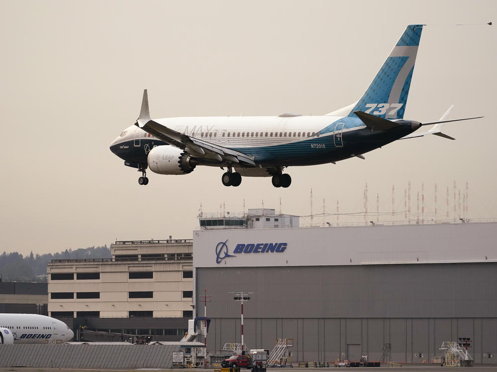 A Boeing 737 MAX jet, piloted by Federal Aviation Administration (FAA) chief Steve Dickson, prepares to land at Boeing Field following a test flight on Wednesday.