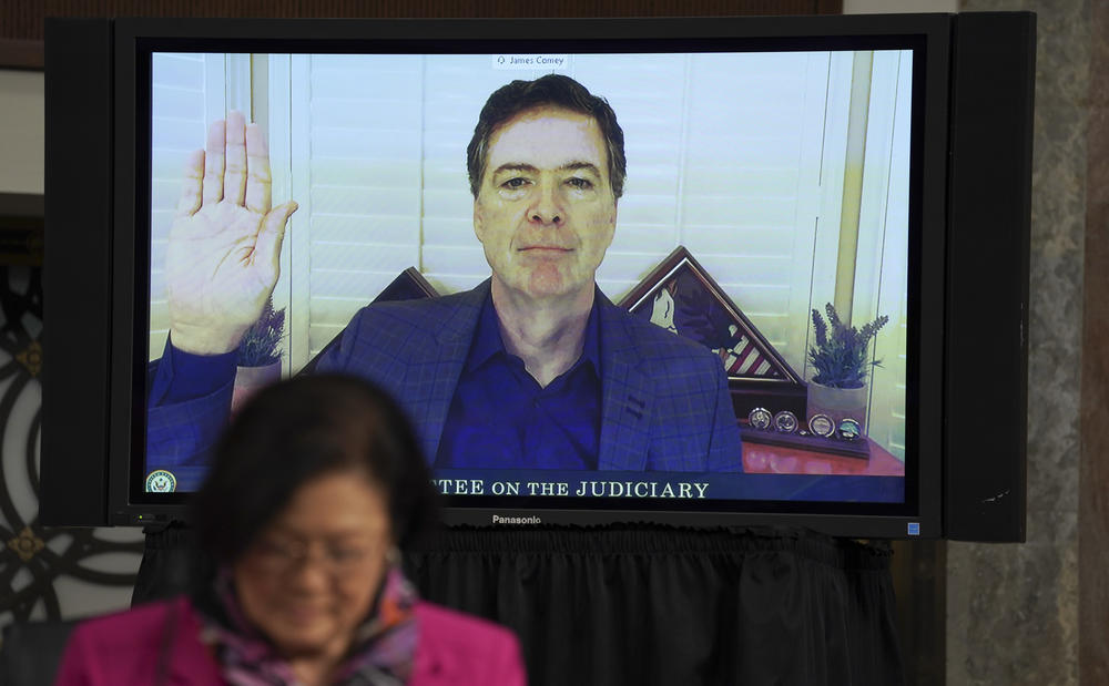 Former FBI Director James Comey is sworn in via videoconference during a Senate Judiciary Committee hearing on Wednesday.