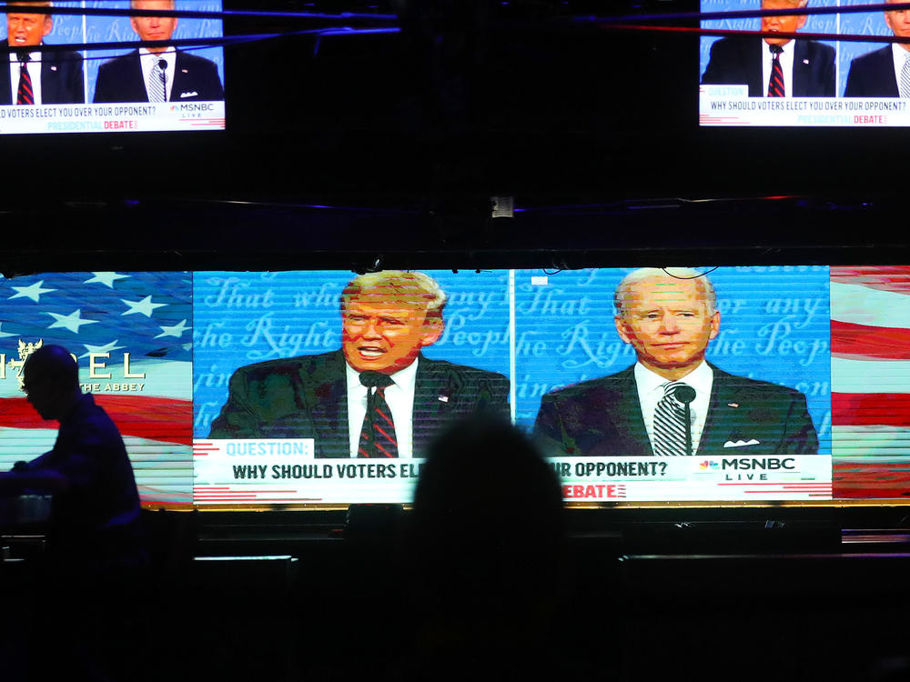 A broadcast of the first debate between President Trump and Democratic nominee Joe Biden is played on TVs at The Abbey in West Hollywood, Calif.