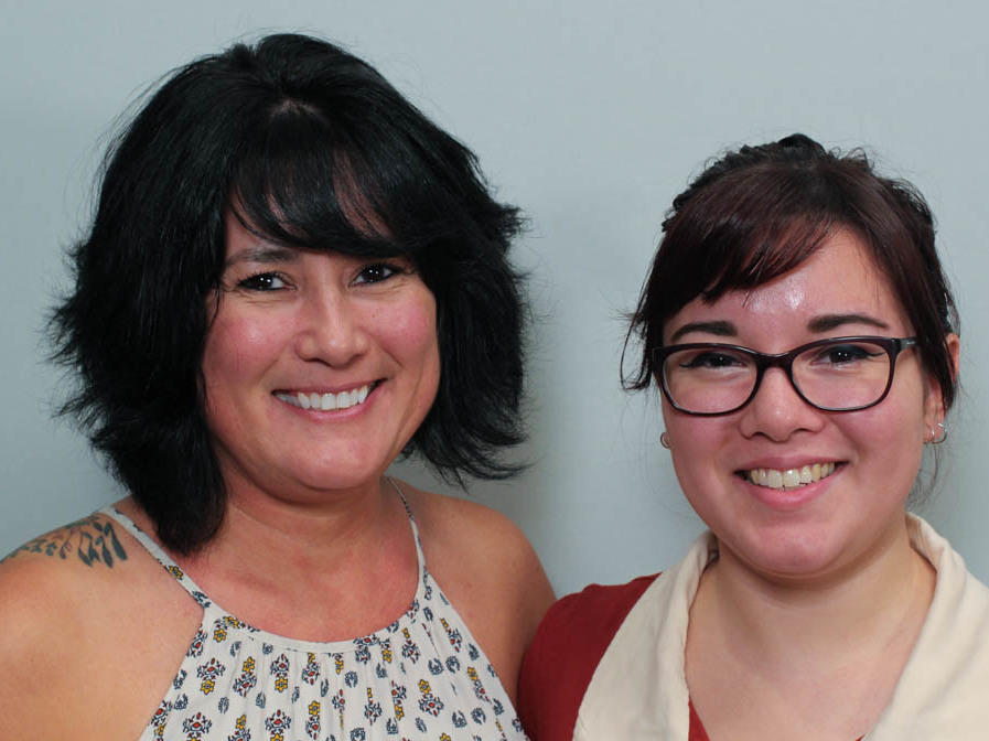 Michelle Huston, left, and her daughter, Lauren Magaña, reflected on their careers as social workers during their first interview with StoryCorps in Atlanta in 2018.