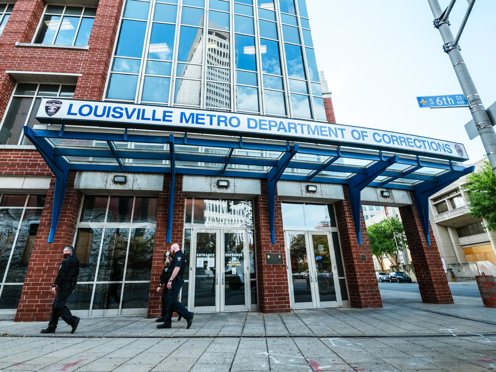 Kentucky's Jefferson County Circuit Court has released audio of the grand jury proceedings in the Breonna Taylor case. Here, police officers walk by the Louisville Metro Department of Corrections, which sits adjacent to Jefferson Square Park, the epicenter for Black Lives Matter protests over Taylor's death.