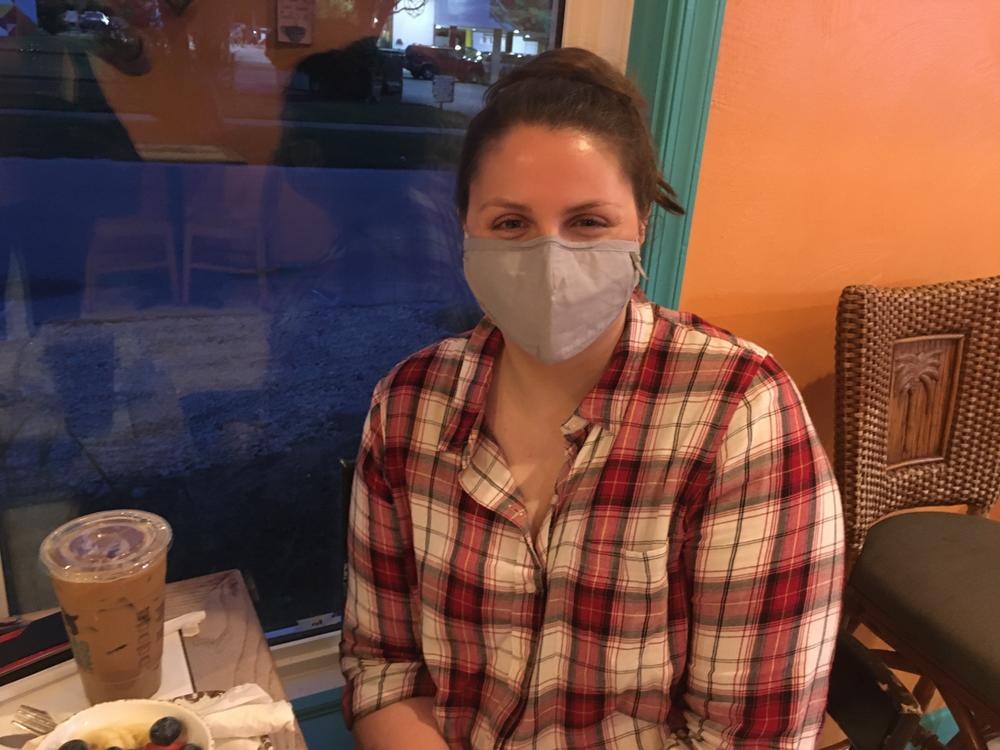 Monica Scott, a Biden supporter, said she hopes President Trump's positive coronavirus test will cause more Americans to take the virus seriously.
