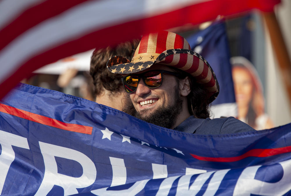 Trump supporters gather outside of Walter Reed National Military Medical Center where the president is hospitalized in treatment for coronavirus.