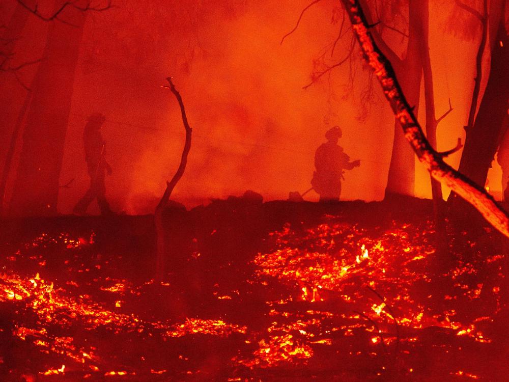 More than 4 million acres have burned in California during this year's wildfire season. Nearly 17,000 firefighters are still working to contain at least 23 major fires in the state.