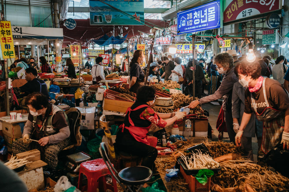 Before the holiday, shoppers buy groceries at Gyeongdong Market in eastern Seoul for the preparation of ritual foods for Chuseok.