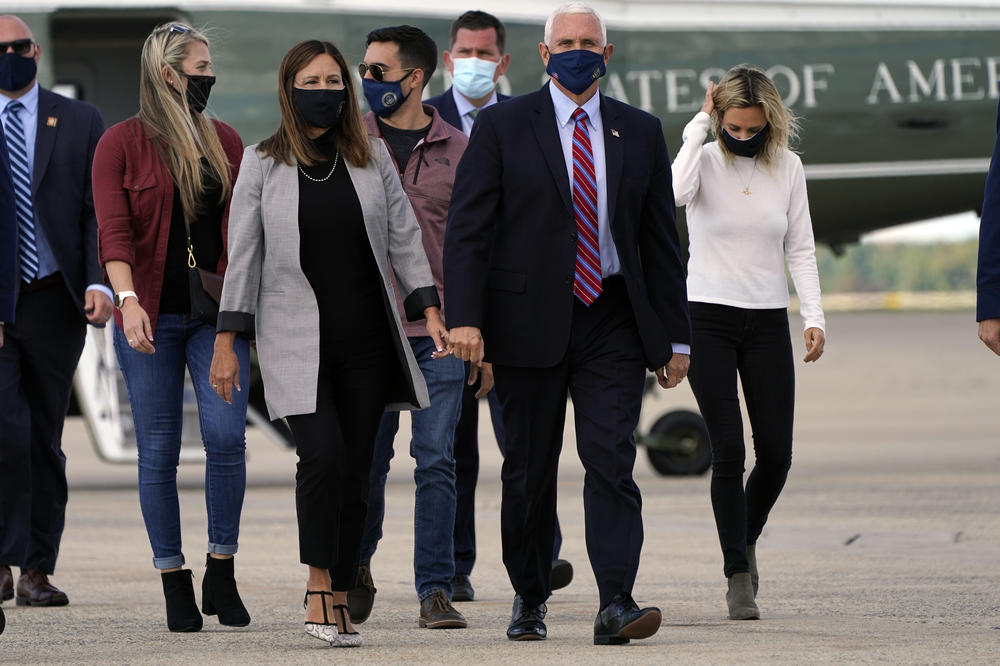 Vice President Pence and his family arrive on Marine Two at Andrews Air Force Base, Md., on Monday as he departs for Utah ahead of the vice presidential debate.