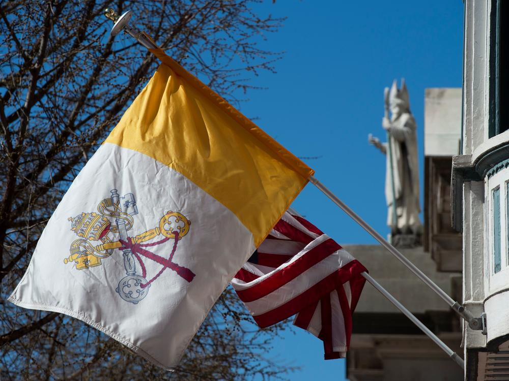 The U.S. flag and flag of Vatican City are hung on the outside of the Pennsylvania Catholic Conference building in Harrisburg, Pa., on March 26, 2019. Catholics outnumber Evangelicals in Pennsylvania by a 2-to-1 margin.