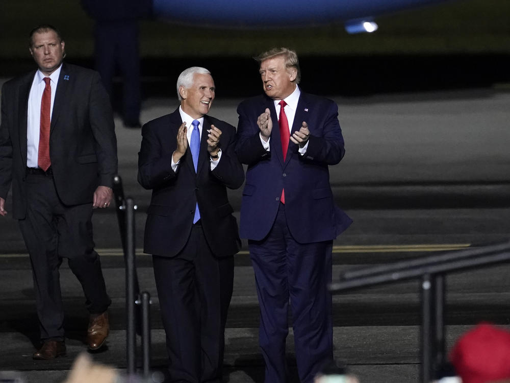 Vice President Mike Pence and President Trump at a campaign rally at Newport News, Va., on Sept. 25, a week before Trump was hospitalized with COVID-19.