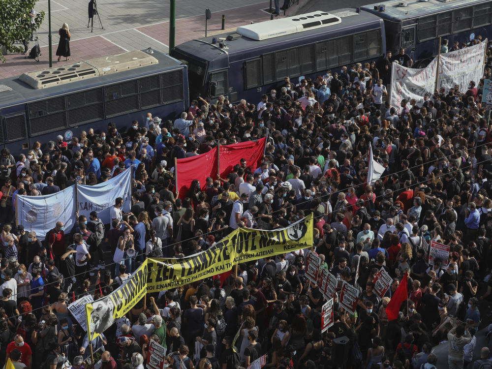 Thousands of people gather for an anti-fascist protest outside a court in Athens on Wednesday. The court ruled the neo-Nazi Golden Dawn party was operating as a criminal organization, and delivered landmark guilty verdicts in a five-year trial against dozens of defendants, including former lawmakers.