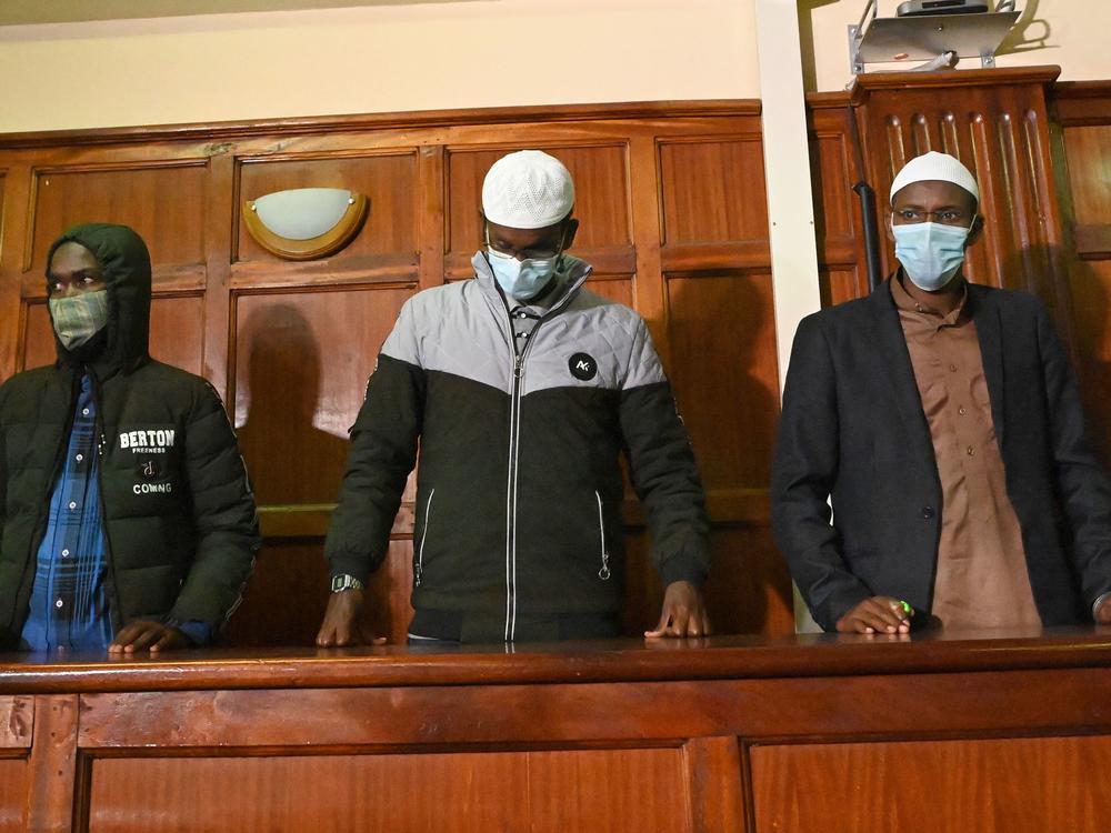 Suspects (left to right) Hassan Hussein Mustafa, Liban Abdullahi Omar, and Mohamed Ahmed Abdi standing in the dock during their appearance for their case at the Milimani court in Nairobi on Wednesday. Abdi and Mustafa were found guilty, while Omar was acquitted of charges.