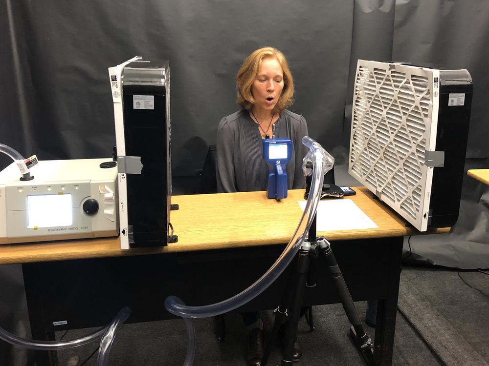 Soprano Allison Hughes participates in research led by University of Maryland professors Jelena Srebric and Donald Milton into ways to reduce the risk of COVID-19 transmission during public events such as musical performances or political debates.