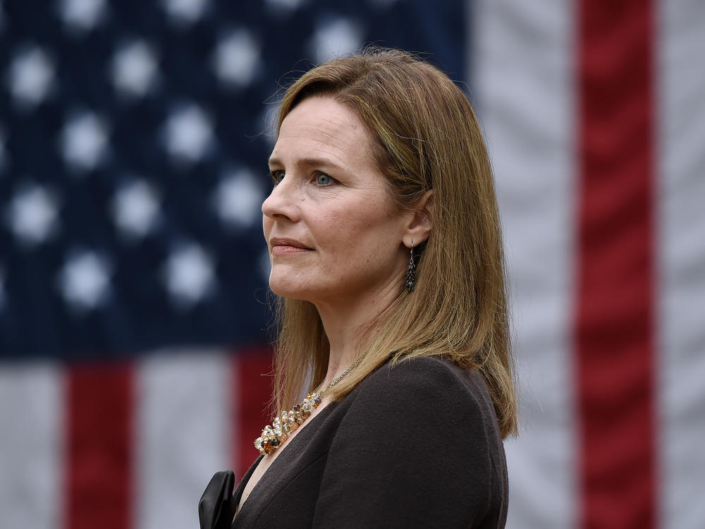 Judge Amy Coney Barrett, here at the White House on Sept. 26, is President Trump's Supreme Court nominee — and she has gun control groups worried.