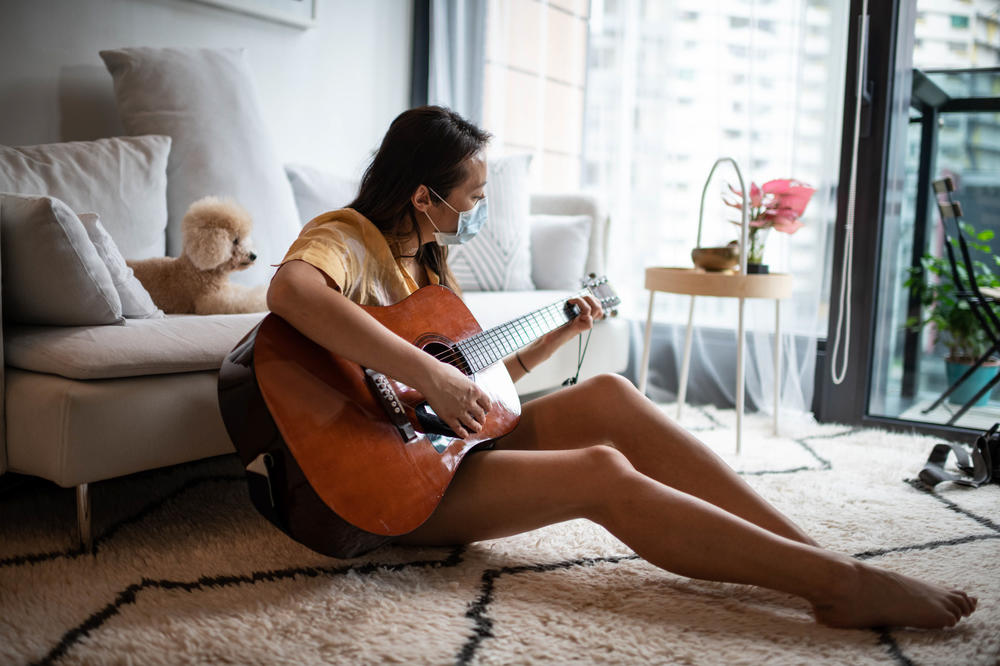 Hamill plays her father's 52-year-old guitar.