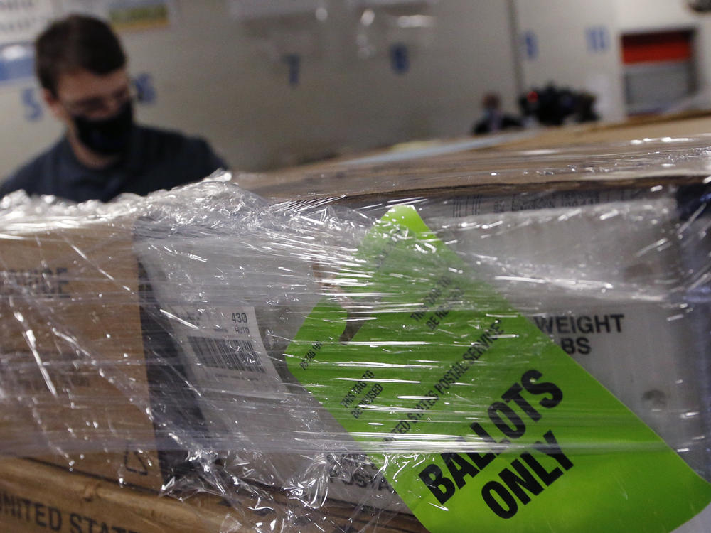 Blank absentee ballots are delivered to the U.S. Postal Service on Monday in Frankly County, Ohio. About 50,000 voters will receive replacement ballots after an error was found.