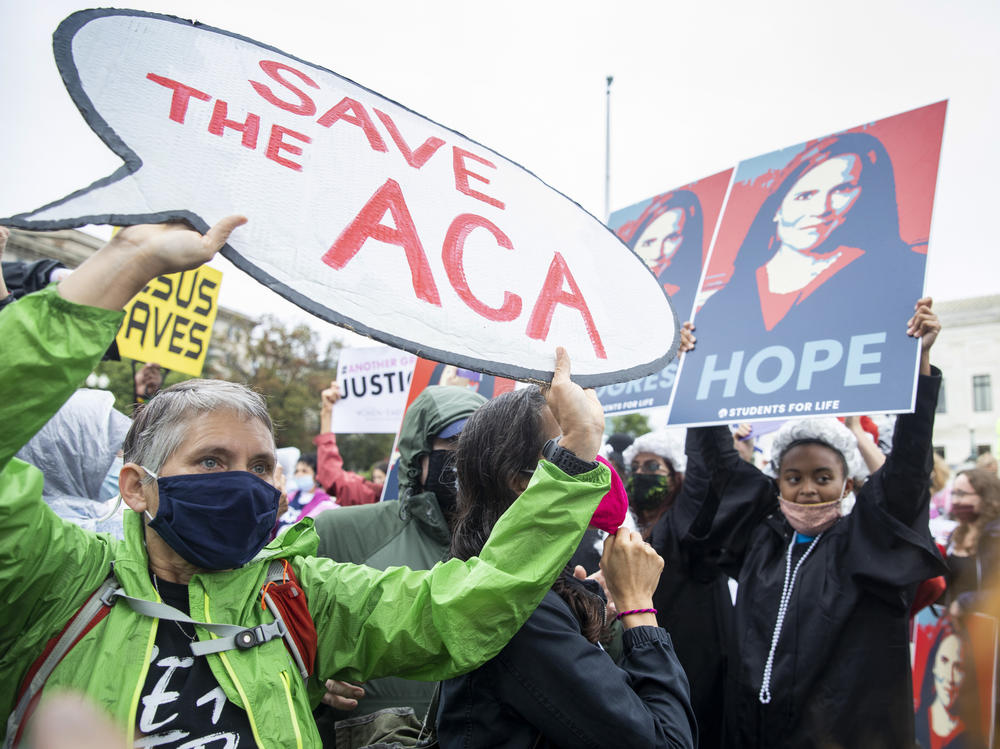 On the first day of Senate hearings over the confirmation of Judge Amy Coney Barrett to the Supreme Court, supporters and opponents of the confirmation confront each other in front of the Supreme Court.