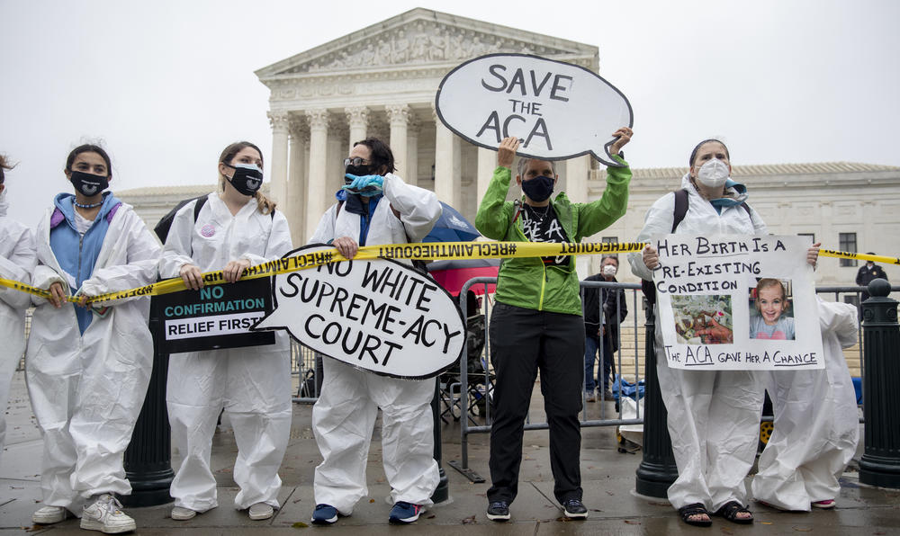 Opponents of Amy Coney Barrett's confirmation gather in front of the Supreme Court on Monday.