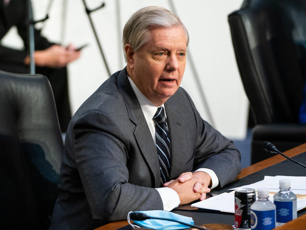 Senate Judiciary Chairman Sen. Lindsey Graham, R-S.C., speaks on the first day of Amy Coney Barrett's Supreme Court confirmation hearing on Capitol Hill on Monday. Graham defended the Republican effort to move swiftly on Barrett's confirmation.