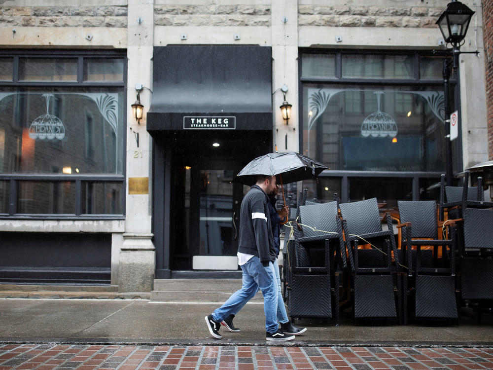 Chairs are stacked outside a restaurant in Montreal on Sept. 29. The Quebec government ordered restaurants, bars and casinos to close for 28 days, effective midnight Sept. 30, after a recent spike in new daily coronavirus cases.