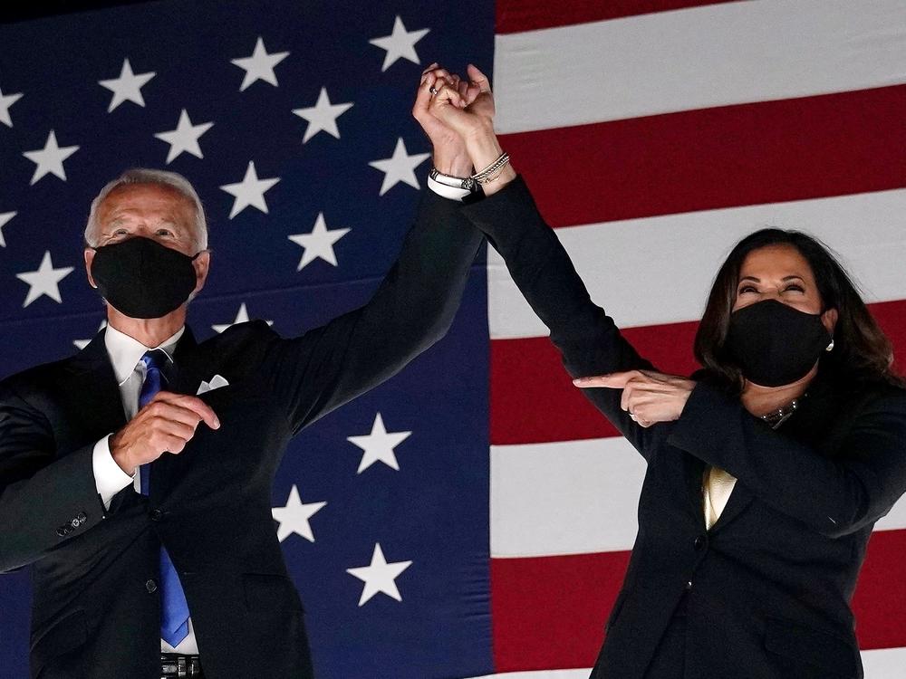 Former vice-president and Democratic presidential nominee Joe Biden and Senator from California and Democratic vice presidential nominee Kamala Harris greet supporters outside the Chase Center in Wilmington, Delaware.