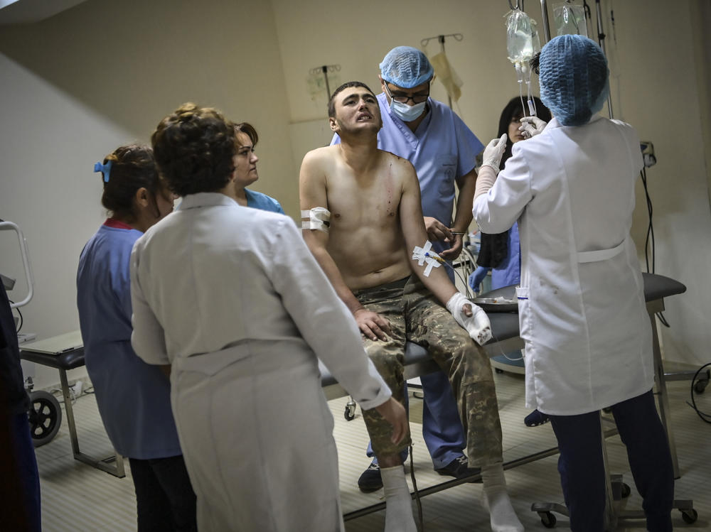An wounded Armenian soldier getting treatment in the basement of a medical center on Wednesday outside the city of Stepanakert, in the Nagorno-Karabakh region.