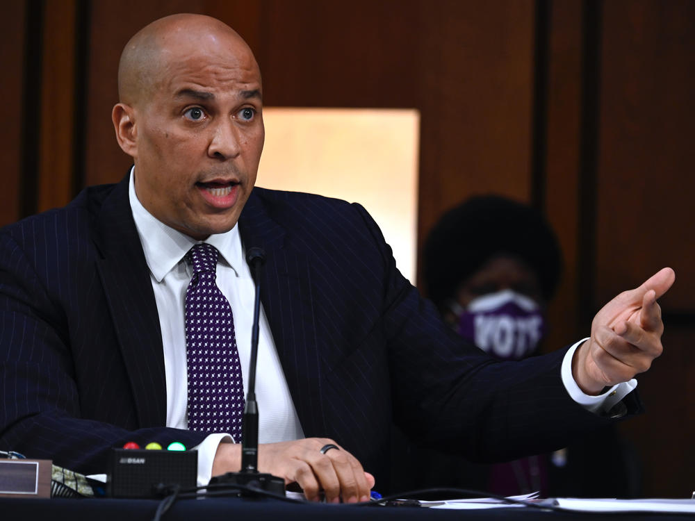 Sen. Cory Booker, D-N.J., questions Supreme Court nominee Judge Amy Coney Barrett as she testifies before the Senate Judiciary Committee on the third day of her confirmation hearing.  (Andrew Caballero-Reynolds-Pool/Getty Images)