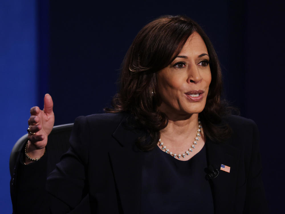 Democratic vice presidential nominee and California Sen. Kamala Harris, seen here during the Oct. 7 vice presidential debate, is postponing in-person campaign events after two people traveling with her tested positive for the coronavirus.