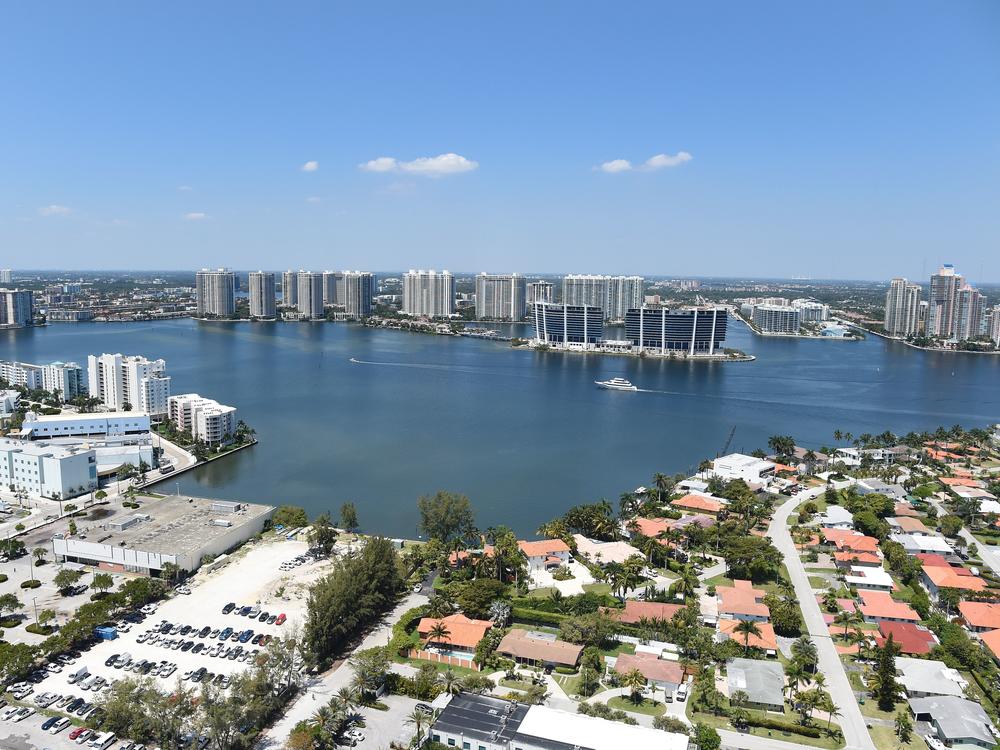 A new study has found that home sale prices and volume appear to be declining in Florida coastal areas at vulnerable-to-rising sea levels compared to coastal areas with less risk. Here, the balcony view from a luxury condo in Sunny Isles Beach, Fla., in 2017.