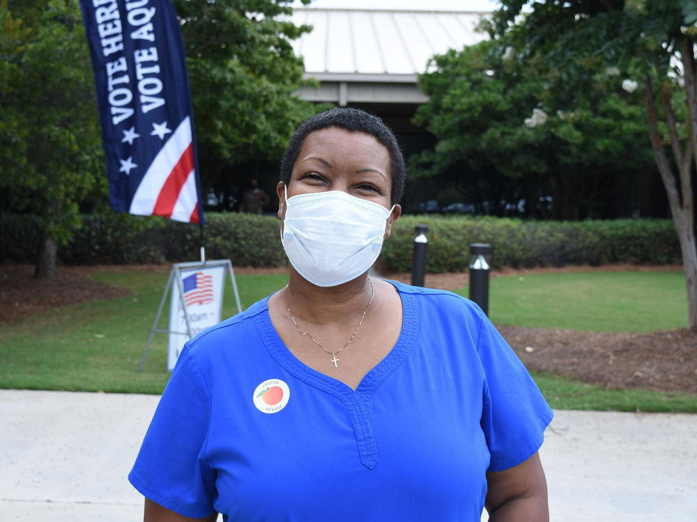 Angela Maddox didn't have to wait to vote in a primary runoff in August in Gwinnett County. She says reports of voters waiting six hours or more in the primary were 