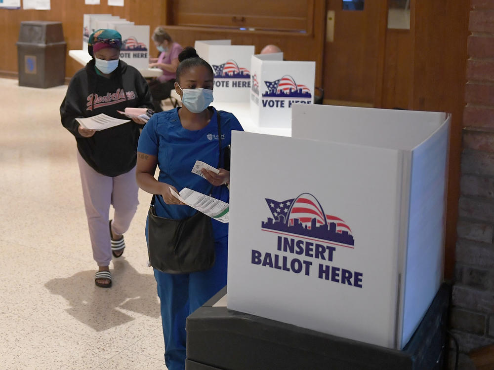 Voters cast their ballots in Missouri's primary election on August 4, 2020 at Gambrinus Hall in St Louis, Missouri. In November, voters will decide on Amendment 3 which would change the state's approach to redistricting.